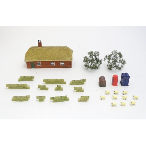 1489 - Toys: A quantity of Hornby accessories comprising Honeysuckle Cottage, no. R9675 and an Anderson She... 