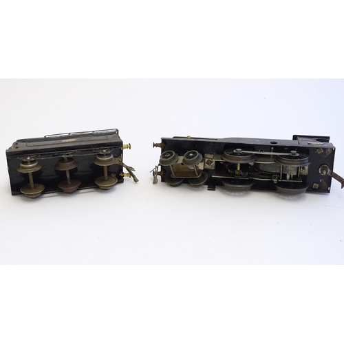 1490 - Toys: A quantity of assorted Hornby Meccano O gauge trains, to include a 4-4-0 clockwork locomotive ... 