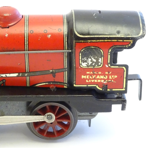 1490 - Toys: A quantity of assorted Hornby Meccano O gauge trains, to include a 4-4-0 clockwork locomotive ... 