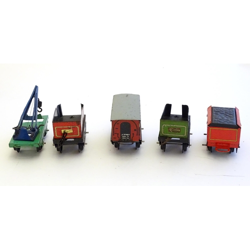 1490 - Toys: A quantity of assorted Hornby Meccano O gauge trains, to include a 4-4-0 clockwork locomotive ... 