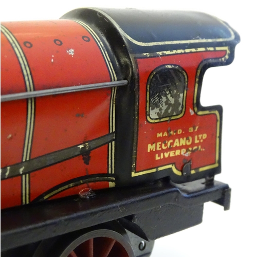 1490 - Toys: A quantity of assorted Hornby Meccano O gauge trains, to include a 4-4-0 clockwork locomotive ... 