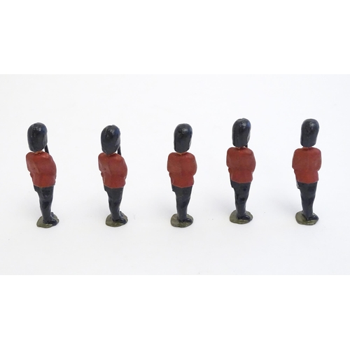 1491 - Toys: A quantity of lead models of marching band soldiers with instruments, Queen's Guard guardsmen,... 