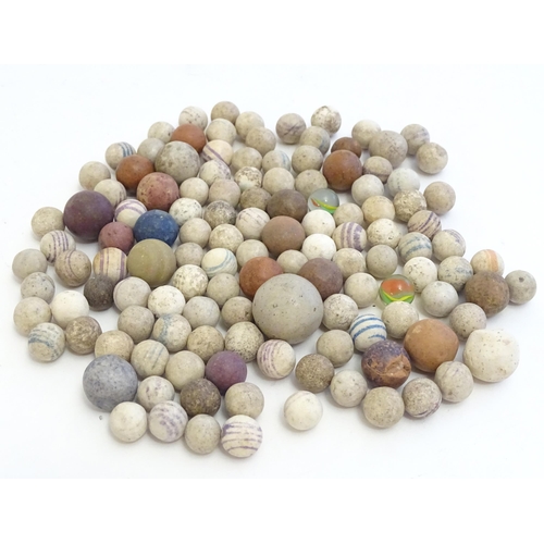 1492 - Toys: A quantity of assorted Victorian marbles to include hand painted ceramic examples, etc.