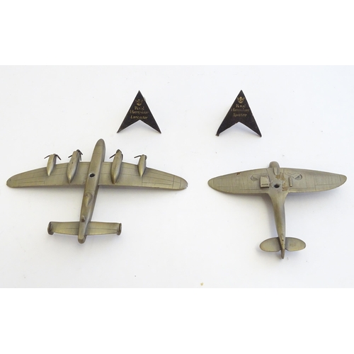 1493 - Toys: Two Royal Hampshire cast model aeroplanes / fighter planes comprising Lancaster and Spitfire, ... 