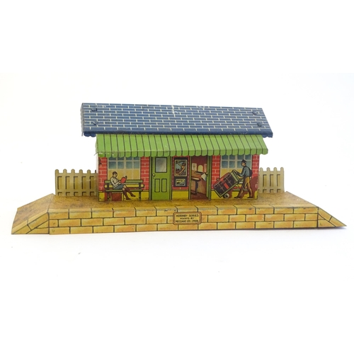 1497 - Toys: A quantity of Hornby Meccano O gauge trains and railway accessories comprising a 0-4-0 Great W... 