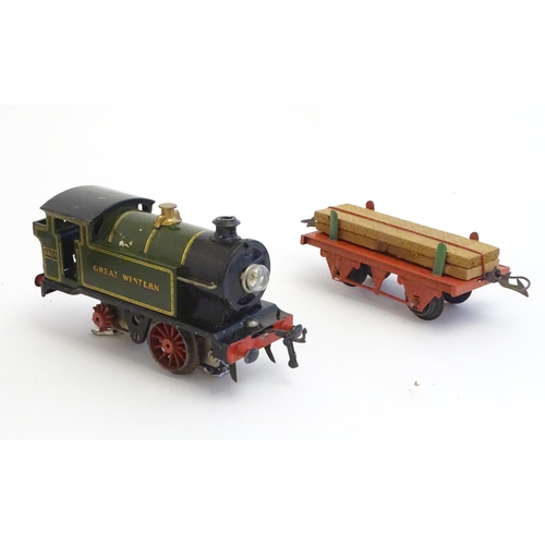 1497 - Toys: A quantity of Hornby Meccano O gauge trains and railway accessories comprising a 0-4-0 Great W... 