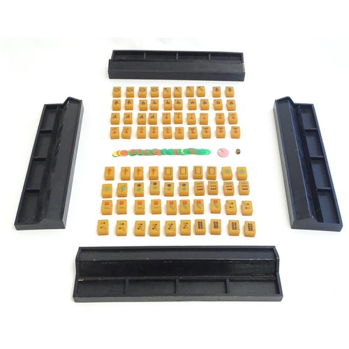 1507 - Toys: Early 20thC Bakelite / Catalin mahjong tiles and four stands. With Directions of Playing Chine... 