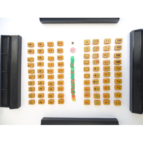 1507 - Toys: Early 20thC Bakelite / Catalin mahjong tiles and four stands. With Directions of Playing Chine... 