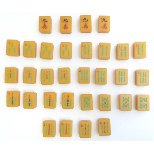 1507 - Toys: Early 20thC Bakelite / Catalin mahjong tiles and four stands. With Directions of Playing Chine... 