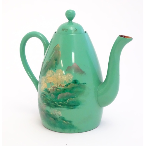 1516A - Toys: A Japanese green lacquer coffee wares comprising coffee pot, six cups and saucers and a rectan... 