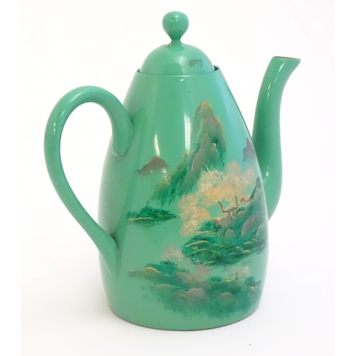 1516A - Toys: A Japanese green lacquer coffee wares comprising coffee pot, six cups and saucers and a rectan... 