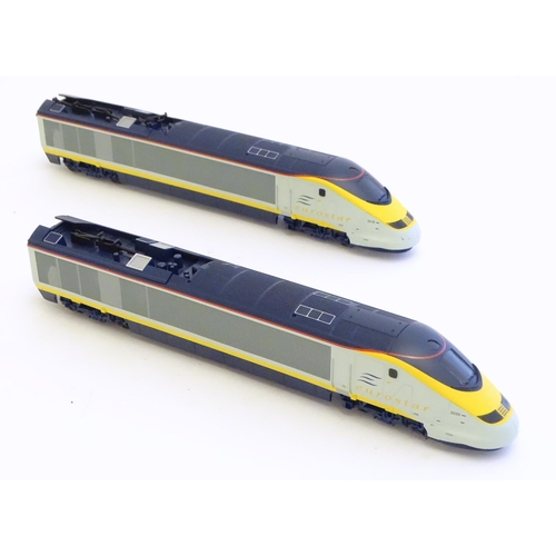 1521 - Toys: A Hornby electric OO gauge Eurostar train set, comprising the Eurostar driving unit, passenger... 