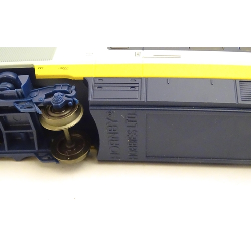 1521 - Toys: A Hornby electric OO gauge Eurostar train set, comprising the Eurostar driving unit, passenger... 