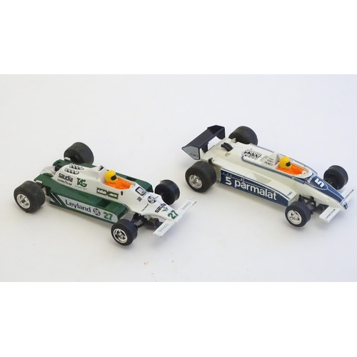 1528 - Toys: A Brands Hatch scalextrics set to include Parmalat Brabham BT49, Saudia Leyland Williams FW07B... 