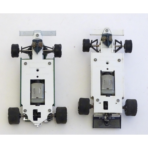 1528 - Toys: A Brands Hatch scalextrics set to include Parmalat Brabham BT49, Saudia Leyland Williams FW07B... 