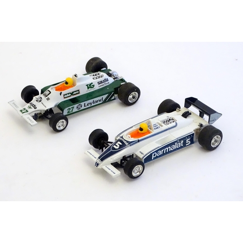 1528 - Toys: A Brands Hatch scalextrics set to include Parmalat Brabham BT49, Saudia Leyland Williams FW07B... 