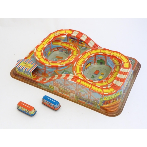 1529 - Toys: A Technofix rollercoaster / funfair game Coney Island, no. 307 with two tinplate clockwork car... 