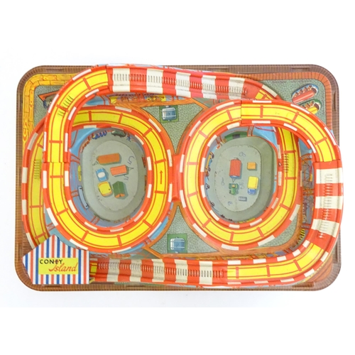 1529 - Toys: A Technofix rollercoaster / funfair game Coney Island, no. 307 with two tinplate clockwork car... 