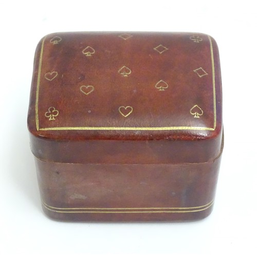 1482 - Toys: A 20thC Italian calf leather box with gilt suit symbol detail, containing small proportion pla... 