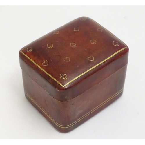 1482 - Toys: A 20thC Italian calf leather box with gilt suit symbol detail, containing small proportion pla... 