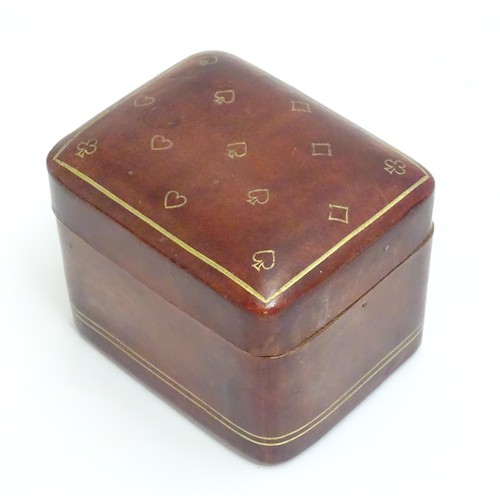 1482 - Toys: A 20thC Italian calf leather box with gilt suit symbol detail, containing small proportion pla... 