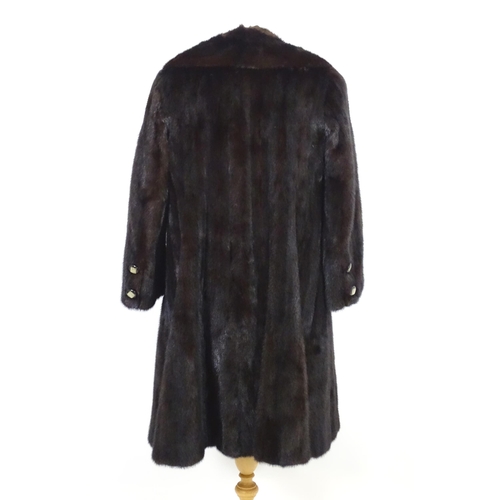 1550 - Vintage clothing / fashion: A 3/4 length vintage mink fur coat with embroidered initials inside 'DH'... 