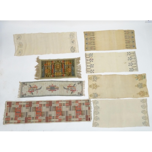 1565 - Five 19thC Turkish towels with embroidered floral and foliate decoration to each end. 
Together with... 