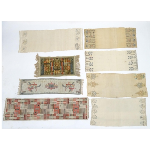 1565 - Five 19thC Turkish towels with embroidered floral and foliate decoration to each end. 
Together with... 