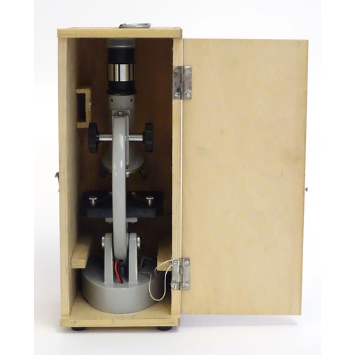 1259 - A 20thC educational microscope, together with quantity of blank slides, prepared slides and slide pr... 