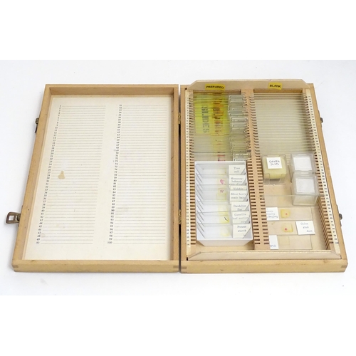 1259 - A 20thC educational microscope, together with quantity of blank slides, prepared slides and slide pr... 