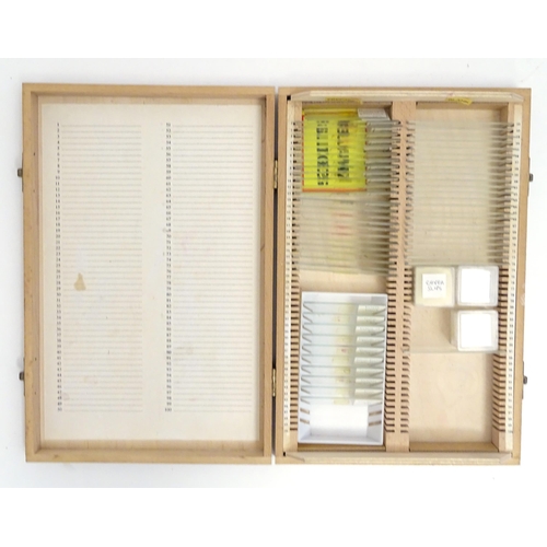 1259 - A 20thC educational microscope, together with quantity of blank slides, prepared slides and slide pr... 