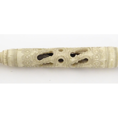 1260A - A Victorian bone letter opener / pen / stanhope with carved and pierced detail, the stanhope depicti... 