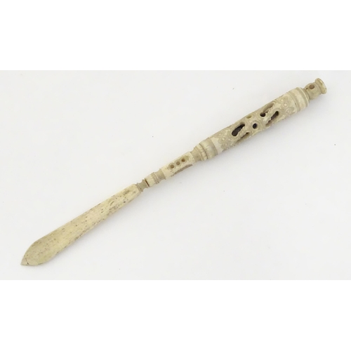 1260A - A Victorian bone letter opener / pen / stanhope with carved and pierced detail, the stanhope depicti... 