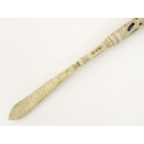 1260A - A Victorian bone letter opener / pen / stanhope with carved and pierced detail, the stanhope depicti... 