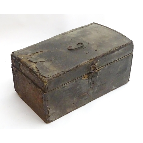 1340 - An 18thC coaching trunk / case, of oak construction with pinned leather exterior and hand forged han... 