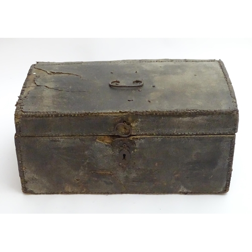 1340 - An 18thC coaching trunk / case, of oak construction with pinned leather exterior and hand forged han... 