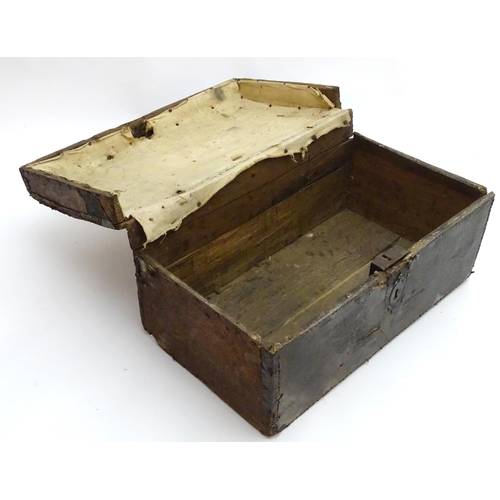 1340 - An 18thC coaching trunk / case, of oak construction with pinned leather exterior and hand forged han... 