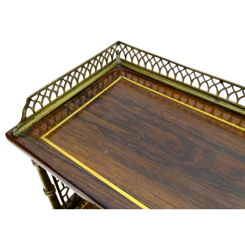 2090 - A Regency period rosewood bonheur du jour attributed to John Mclean, having a pierced brass gallery ... 