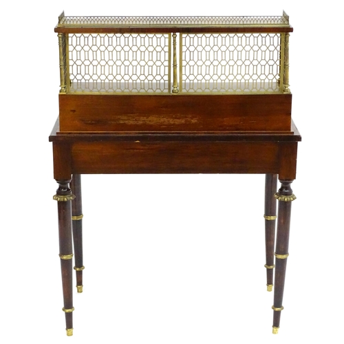 2090 - A Regency period rosewood bonheur du jour attributed to John Mclean, having a pierced brass gallery ... 