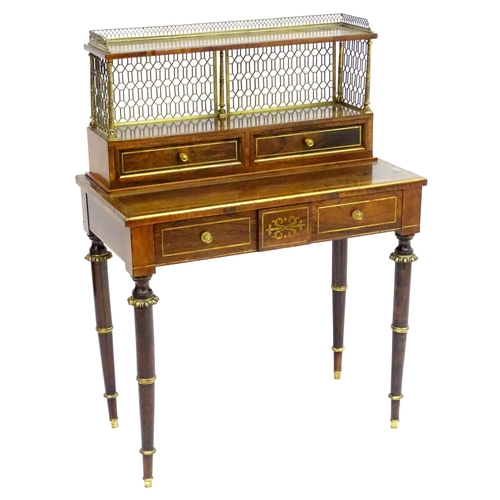 2090 - A Regency period rosewood bonheur du jour attributed to John Mclean, having a pierced brass gallery ... 