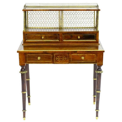 2090 - A Regency period rosewood bonheur du jour attributed to John Mclean, having a pierced brass gallery ... 