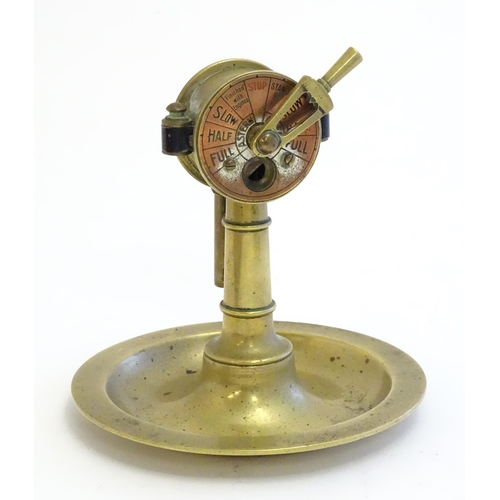 1180A - An early 20thC Continental novelty brass cigar / cheroot cutter and ashtray modelled as a nautical s... 