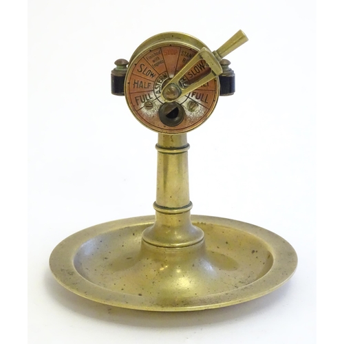 1180A - An early 20thC Continental novelty brass cigar / cheroot cutter and ashtray modelled as a nautical s... 