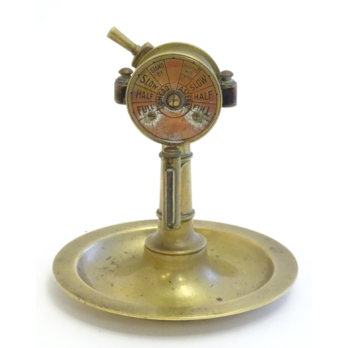 1180A - An early 20thC Continental novelty brass cigar / cheroot cutter and ashtray modelled as a nautical s... 