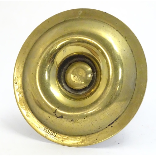 1180A - An early 20thC Continental novelty brass cigar / cheroot cutter and ashtray modelled as a nautical s... 