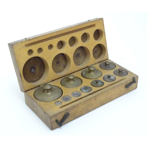 1197 - Late 19th / early 20thC postal scales with a quantity of assorted weights.