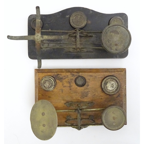 1197 - Late 19th / early 20thC postal scales with a quantity of assorted weights.