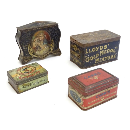 1199 - A quantity of early 20thC advertising tins for tobacco to include Player's Navy Cut cigarettes, Sams... 