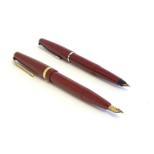 1239 - Two mid 20thC fountain pens, comprising a Conway 57 with 14ct gold nib, together with another by Par... 