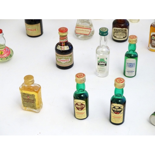 1460 - A quantity of miniature spirit bottles to include Glenfiddich special reserve malt whisky, Drambuie,... 